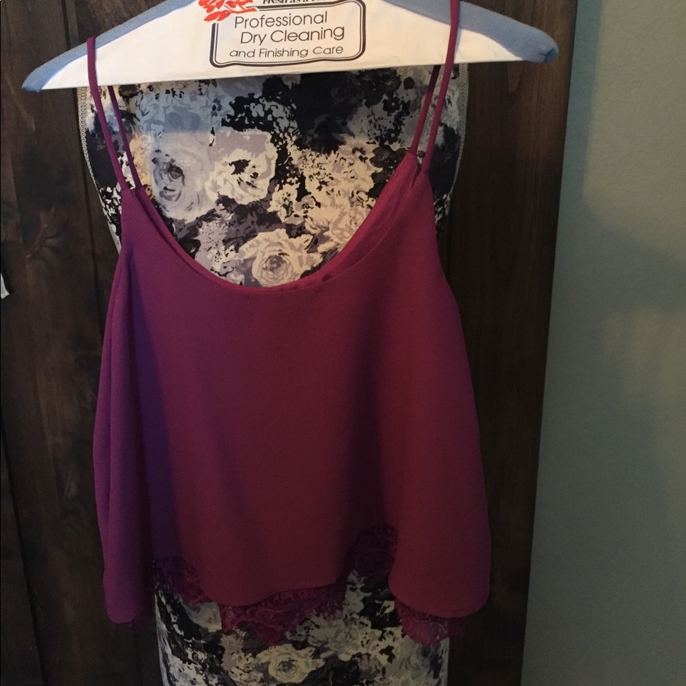 Spaghetti strap top with lace trimming at bottom